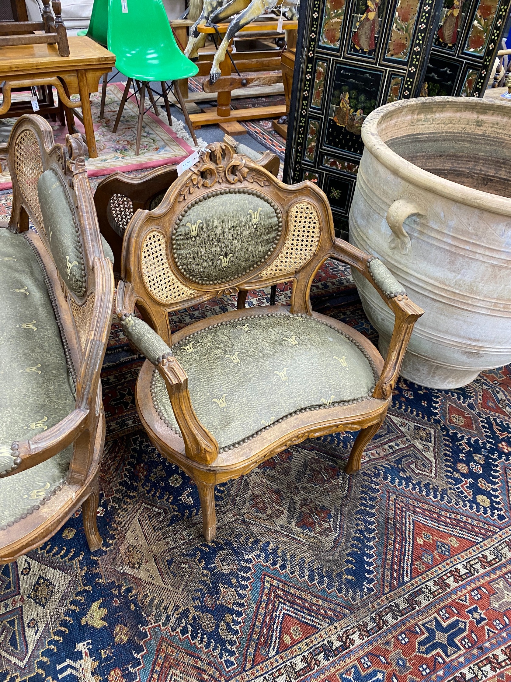 An early 20th century French caned beech four piece salon suite, settee length 130cm, height 86cm